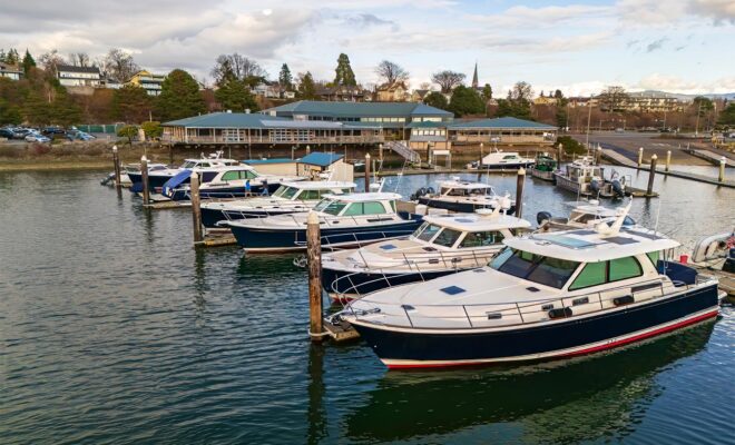 The docks and launch ramp at Bellingham Yachts with several Sabre and Back Cove Yachts in the slips.