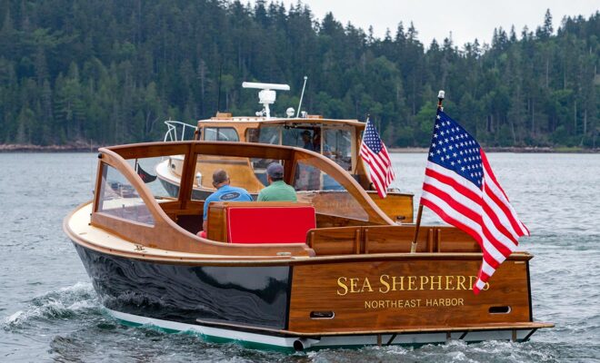 Two lobster yachts cruising on Somes Sound, Maine