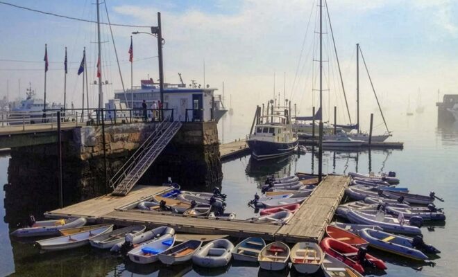 A foggy morning in Rockland Harbor, Maine Harbormaster office and dinghy dock.