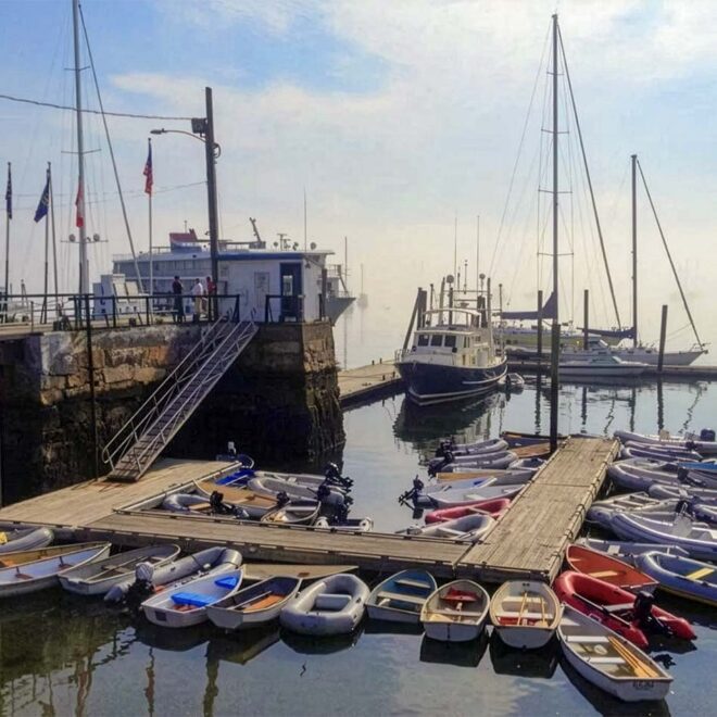 A foggy morning in Rockland Harbor, Maine Harbormaster office and dinghy dock.