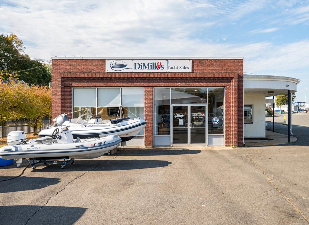DiMillo's Yacht Sales office and two RIBs in the parking lot.