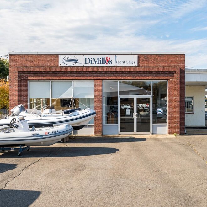 DiMillo's Yacht Sales office and two RIBs in the parking lot.