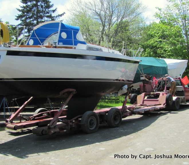After a soggy spring and some late nights, TIME ENOUGH is loaded on the trailer for the short journey from Camden to Rockport.