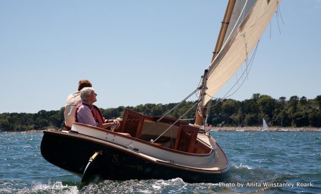 Carl Bechgaard catching the wind in SPINACH, an Arey's Pond 16' Cabin Lynx.