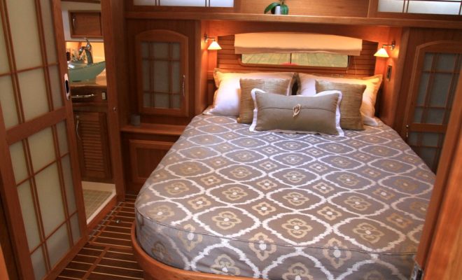 A stateroom that offers a bed running athwartships, rather than only fore-and-aft, is a wonderful twist on the standard layout.