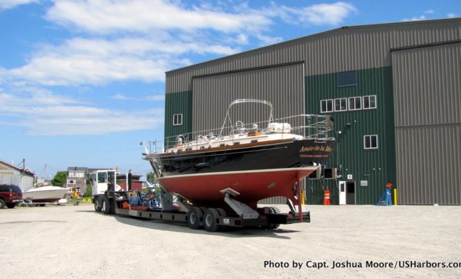 Front Street Shipyard crews maneuver a gorgeous Bristol 47.7 into position for its spring commissioning and launching.