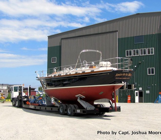 Front Street Shipyard crews maneuver a gorgeous Bristol 47.7 into position for its spring commissioning and launching.