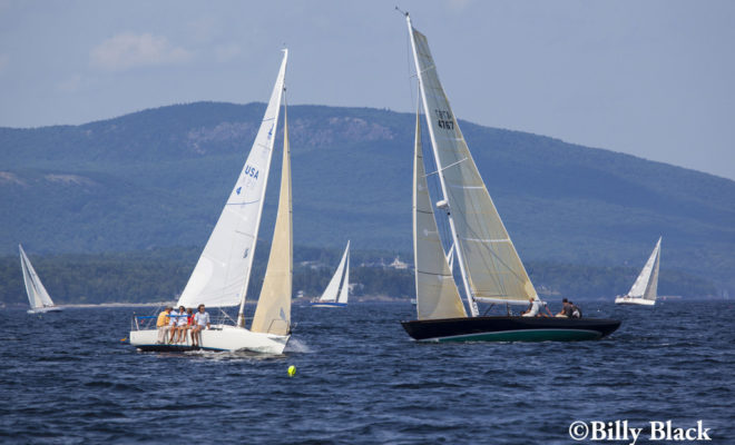 Racing against the backdrop of the Camden hills, two yachts trade tacks in the second annual Penobscot Bay Rendezvous.