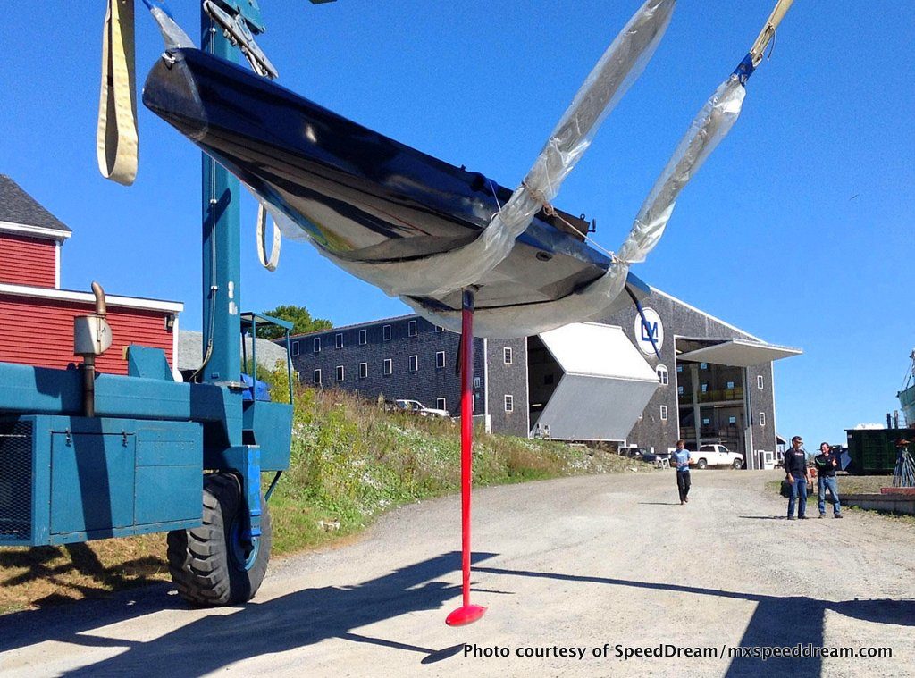 SpeedDream 27 in the slings at Lyman-Morse Boatbuilding in Thomaston, Maine. Check out that keel!