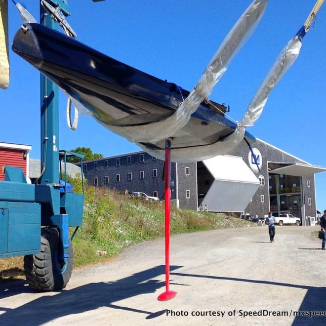 SpeedDream 27 in the slings at Lyman-Morse Boatbuilding in Thomaston, Maine. Check out that keel!