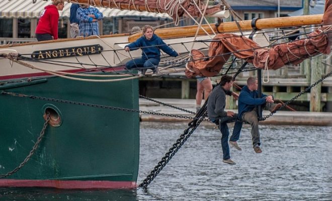 ANGELIQUE, a 95' steel windjammer, returns to its berth in Camden's inner harbor.