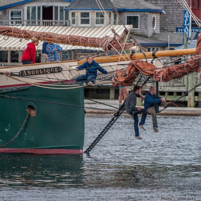 ANGELIQUE, a 95' steel windjammer, returns to its berth in Camden's inner harbor.