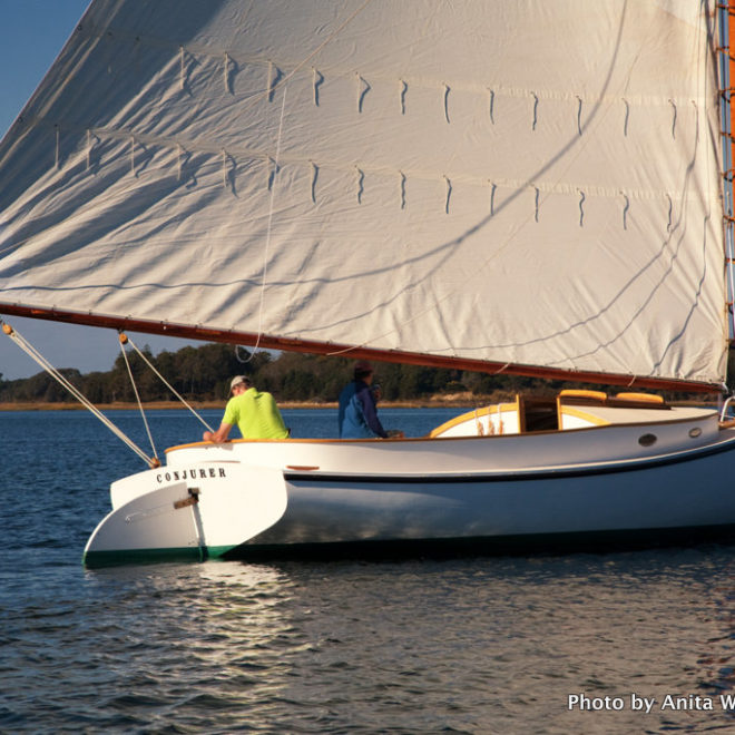 Frededrick Villars, owner of CONJURER (in yellow), and Tony Davis, owner of Arey's Pond Boat Yard, sailing on Oct. 15, 2013.