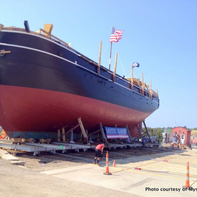 Crews labor to move the massive CHARLES W. MORGAN onto the shiplift that will lower it into the water on July 21.