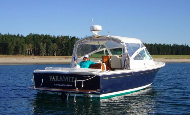 PARAMITA, Mike and Deedie Bouscaren's Harrier 29, floating peacefully on the Maine coastline.