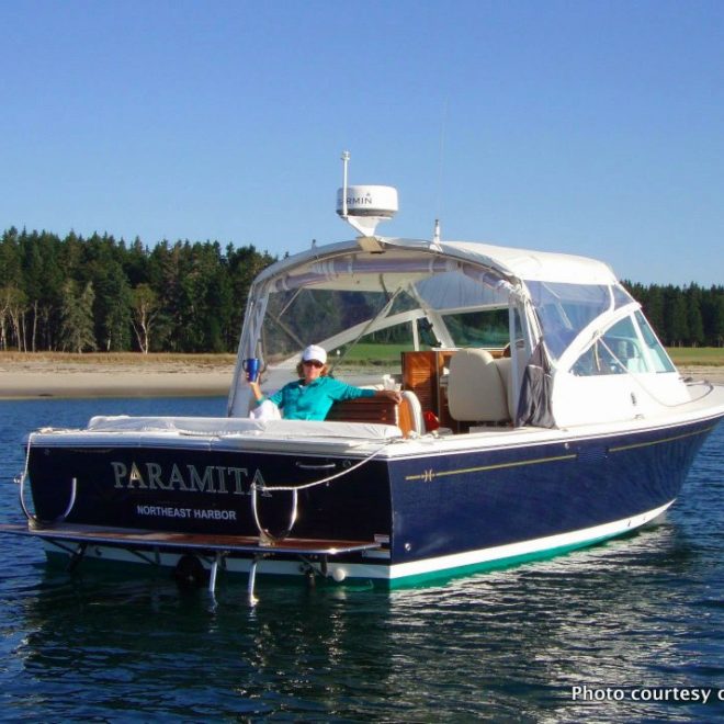 PARAMITA, Mike and Deedie Bouscaren's Harrier 29, floating peacefully on the Maine coastline.
