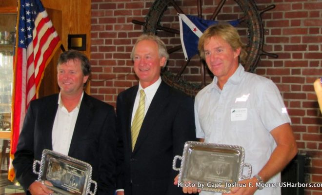 Brad Read, at left, stands with Gov. Lincoln Chafee and Ken Read.