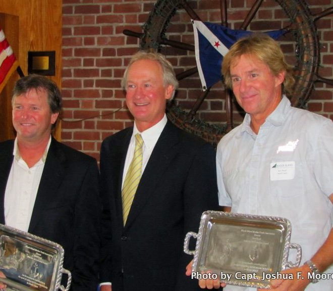 Brad Read, at left, stands with Gov. Lincoln Chafee and Ken Read.