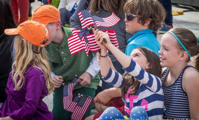 Children gather at the opening of the Volvo Ocean Race village at Fort Adams in May 2015.