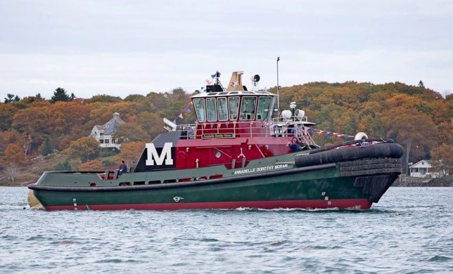 Shortly after launch, ANNABELLE DOROTHY MORAN is towed to her berth at Washburn & Doughty for completion.