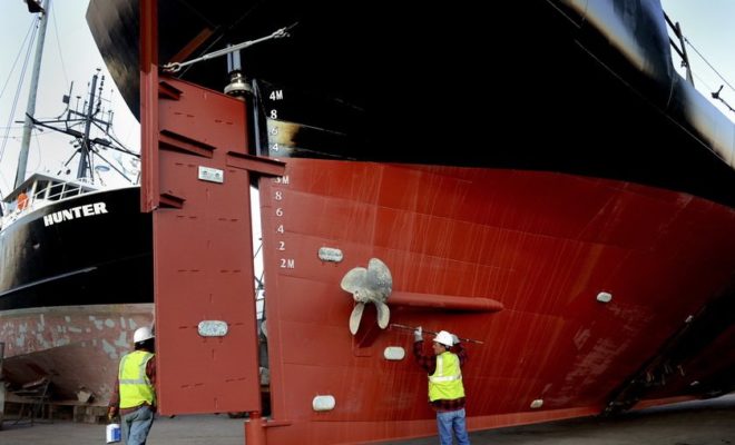 The SSV Oliver Hazard Perry gets a bottom job in December before being towed to Senesco Marine.Photo by Matt Gineo.