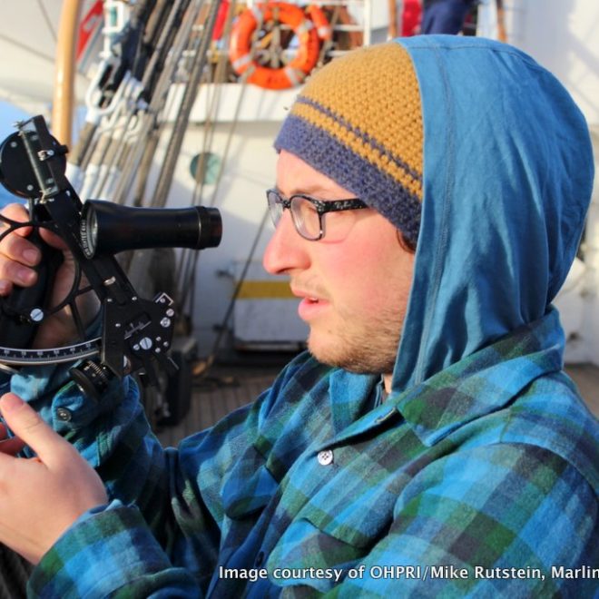 Orion Marker Marion takes a sighting aboard the U.S. Coast Guard Cutter EAGLE.