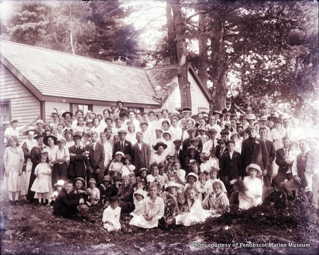 Charles Coombs photographed the Morrill Sunday School visiting his cottage "Ten Oaks," on Tilden Pond in Belmont, in August 1917