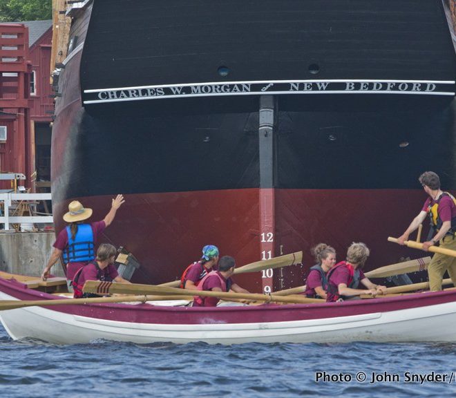 Meeting the mothership. The Whaleboat arrives at the Charles W. Morgan in Mystic Seaport.