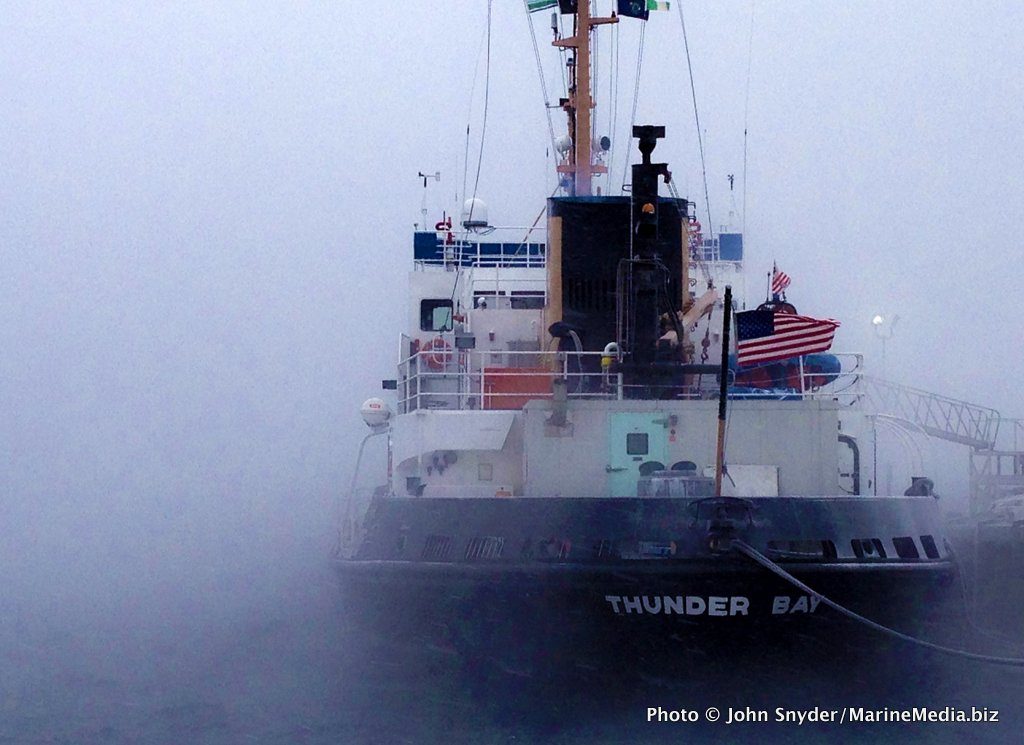 The Coast Guard icebreaker THUNDER BAY sits amid the sea smoke at Tilson's Wharf in Rockland.