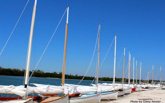 A fleet of catboats on the beach, evidence of another great day of sailing on Pine Island Sound. Photo by Ginny Amsler.