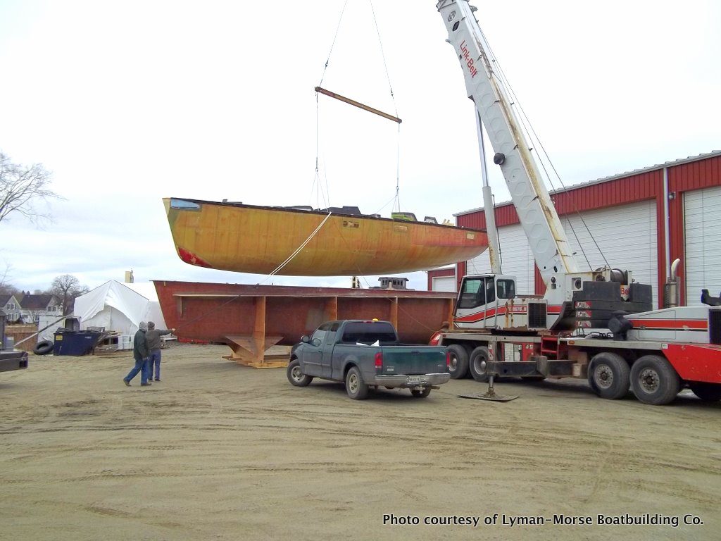 The Paris 63 "Kiwi Spirit" is pulled from its mold at Lyman-Morse Boatbuilding Co.