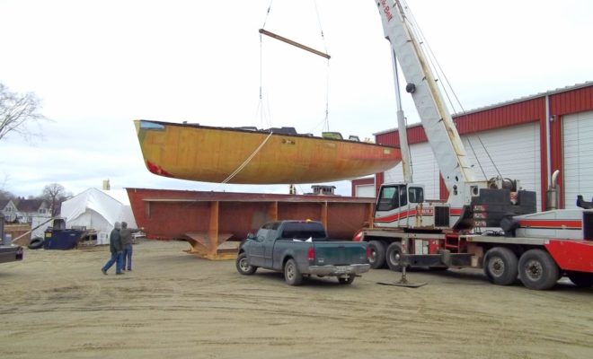 The Paris 63 "Kiwi Spirit" is pulled from its mold at Lyman-Morse Boatbuilding Co.