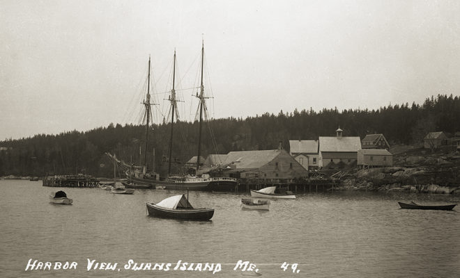 Harbor with the WILLIAM BISBEE tied up at the wharf.