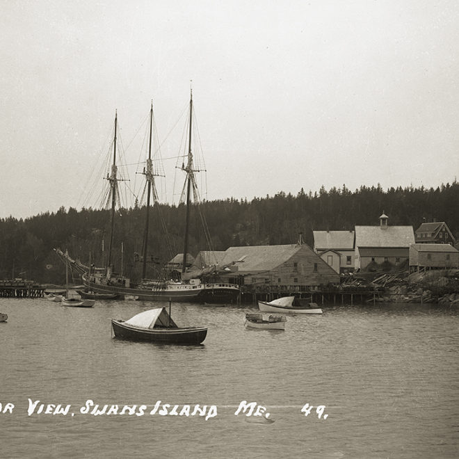 Harbor with the WILLIAM BISBEE tied up at the wharf.