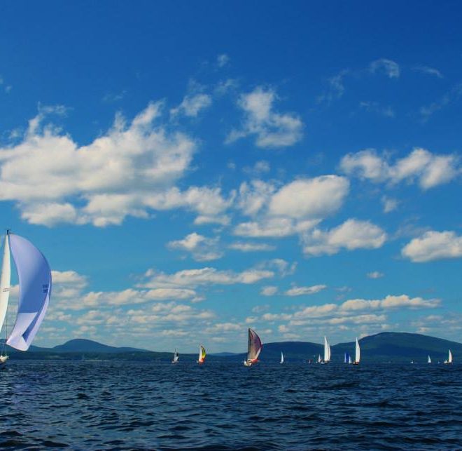 Perfect day, as competitors in the Penobscot Bay Rendezcous sail by the Camden hills.