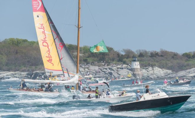 Once the starting gun fired, the boats were charging out of Newport, with the flotilla racing to keep up.