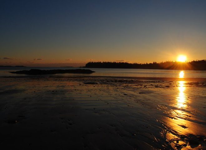 Sunset over the smooth sands of Drift Inn Beach, in Port Clyde.