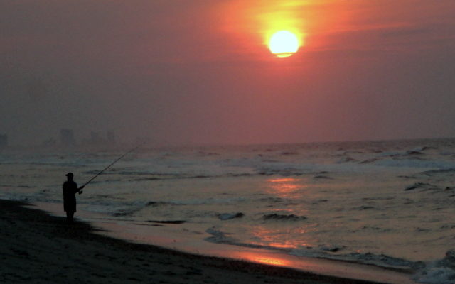 Sunrise surfcaster at North Myrtle Beach on 7/28/2014.