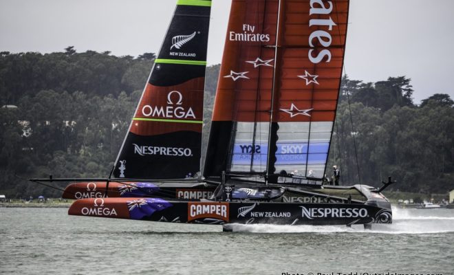 Emirates Team New Zealand, a 72' catamaran, literally flying above the waters off San Francisco.