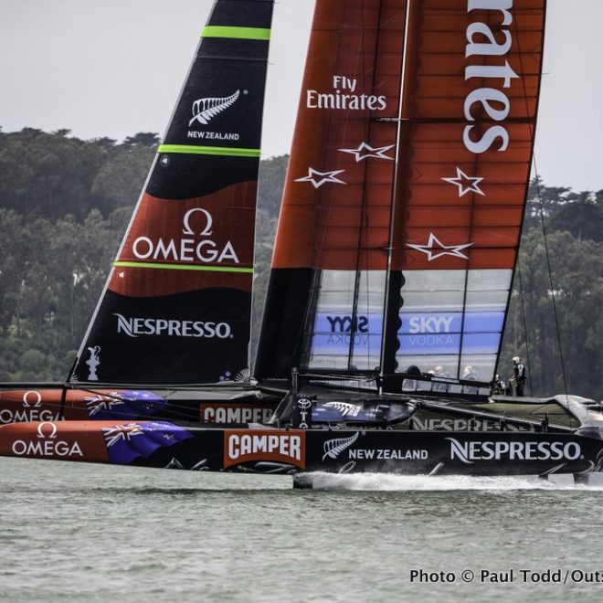 Emirates Team New Zealand, a 72' catamaran, literally flying above the waters off San Francisco.