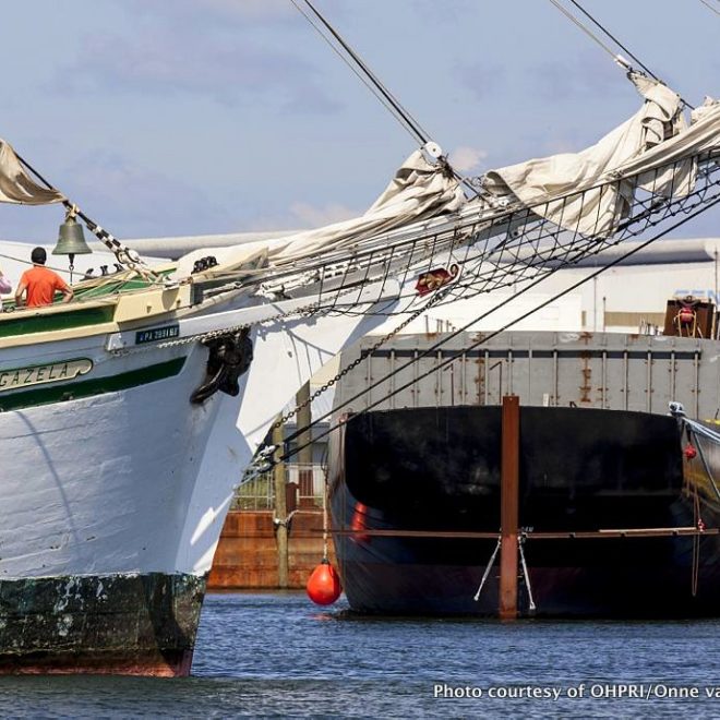 The 177-foot tall ship GAZELA with the hull of the SSV OLIVER HAZARD PERRY in the background.