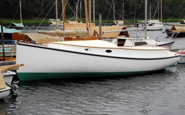 After a complete restoration at Arey's Pond Boat Yard, CONJURER floats once more.