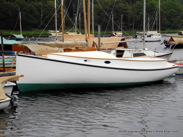 After a complete restoration at Arey's Pond Boat Yard, CONJURER floats once more.