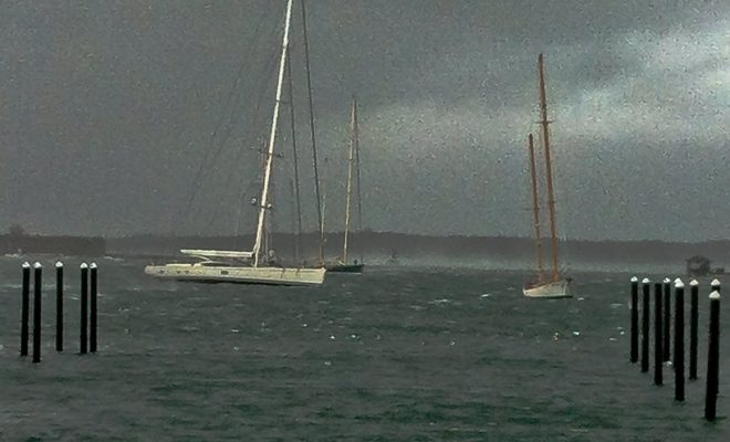 ARTEMIS stands up to a gust in Newport Harbor during Hurricane Sandy. WHITEHAWK is in the foreground and REBECCA just astern.