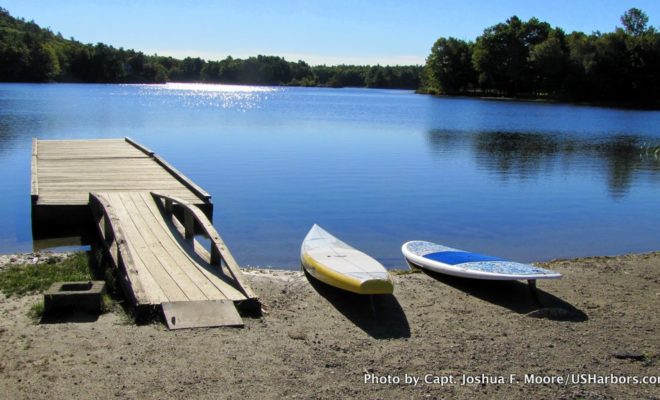 The tranquil water of Hosmer Pond in Camden provided a great spot for trying the SUP phenomenon without risking a chilly dip.