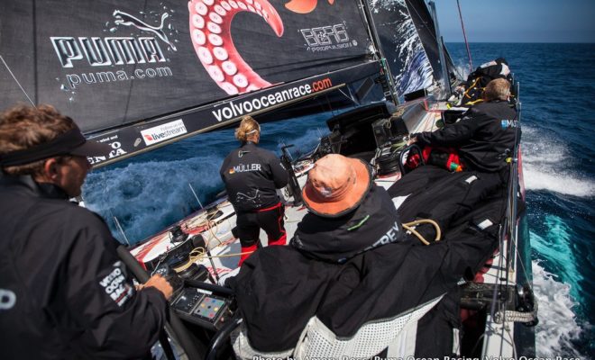 The crew of MAR MOSTRO enjoying high pressure on the approach to Lisbon, Portugal.