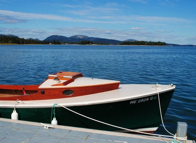 Itching to get out one more time before winter comes, a wooden beauty rests on the docks of Great Cranberry Island.