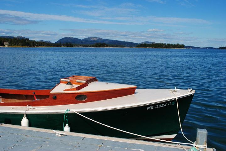 Itching to get out one more time before winter comes, a wooden beauty rests on the docks of Great Cranberry Island.