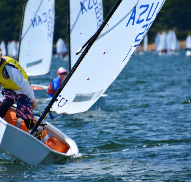 Day 2 of racing, southwest wind about 7 knots, a sailor rounds the first mark.