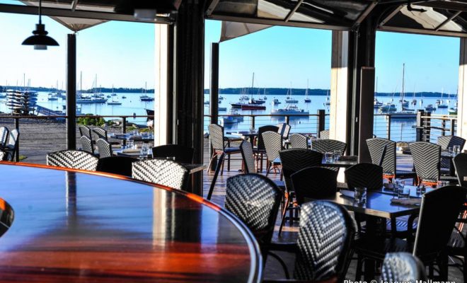 The Dockside Grill offers great food and a great view of the waterfront at Handy Boat.